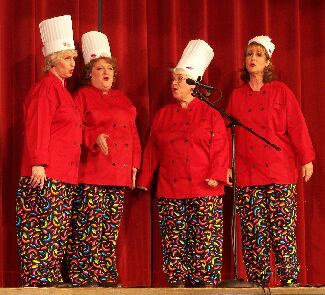 Notice how their hats make up for the differences in height